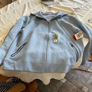 Reebok Pale Blue Full-Zip Hoodie with Tags detail to pockets and on sleeves. XL